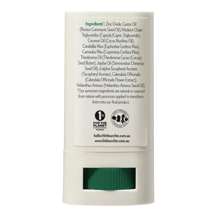 Back side of a white sunscreen stick container showing product details, directions, a barcode, and text indicating zinc oxide 24.5% (w/w) on a white background.
