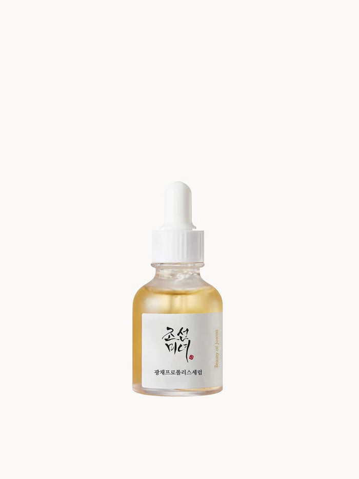 Beauty of Joseon Glow Serum with Propolis and Niacinamide, 30ml, in a clear glass bottle with a pump dispenser.