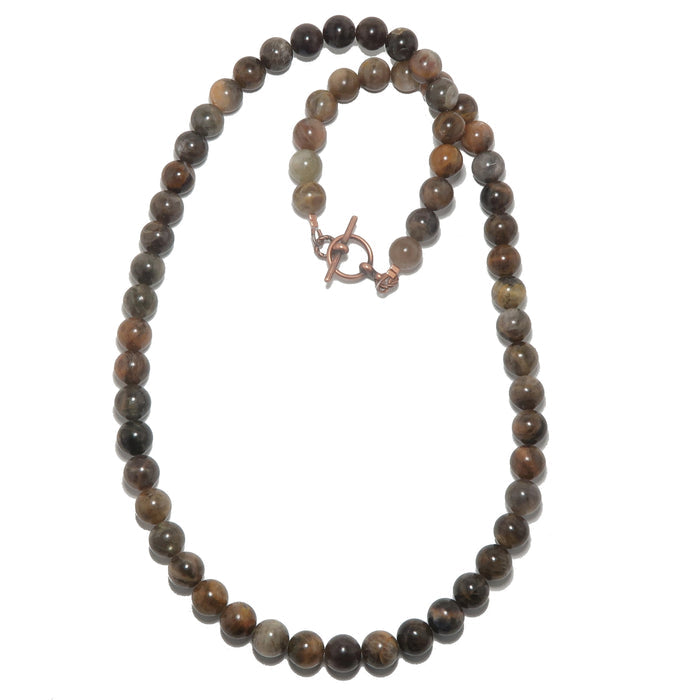 Necklace with moonstone beaded chain on a white background