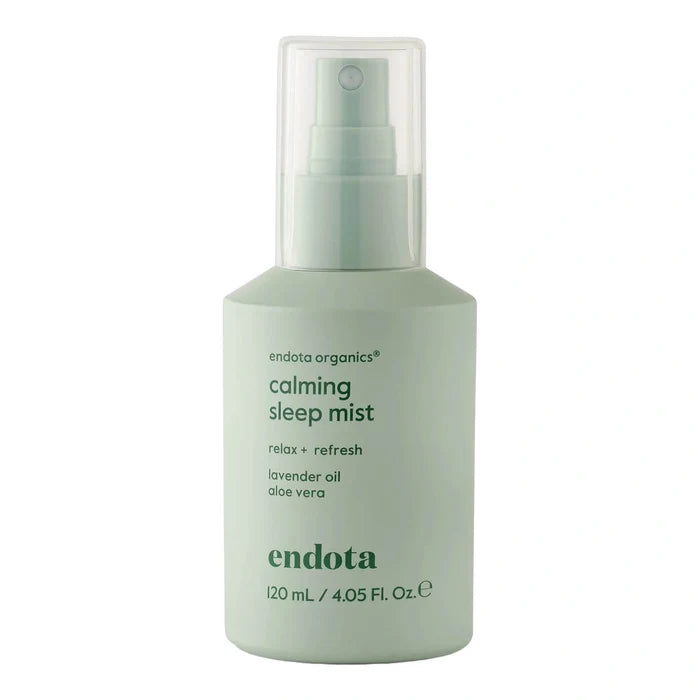 Endota Calming Sleep Mist in a light sage green spray bottle with a clear cap, on a white background.