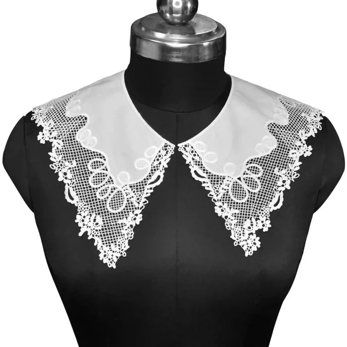 Pilgrim Flower Peter Pan collar featuring delicate floral embroidery with soft rounded edges and vintage charm