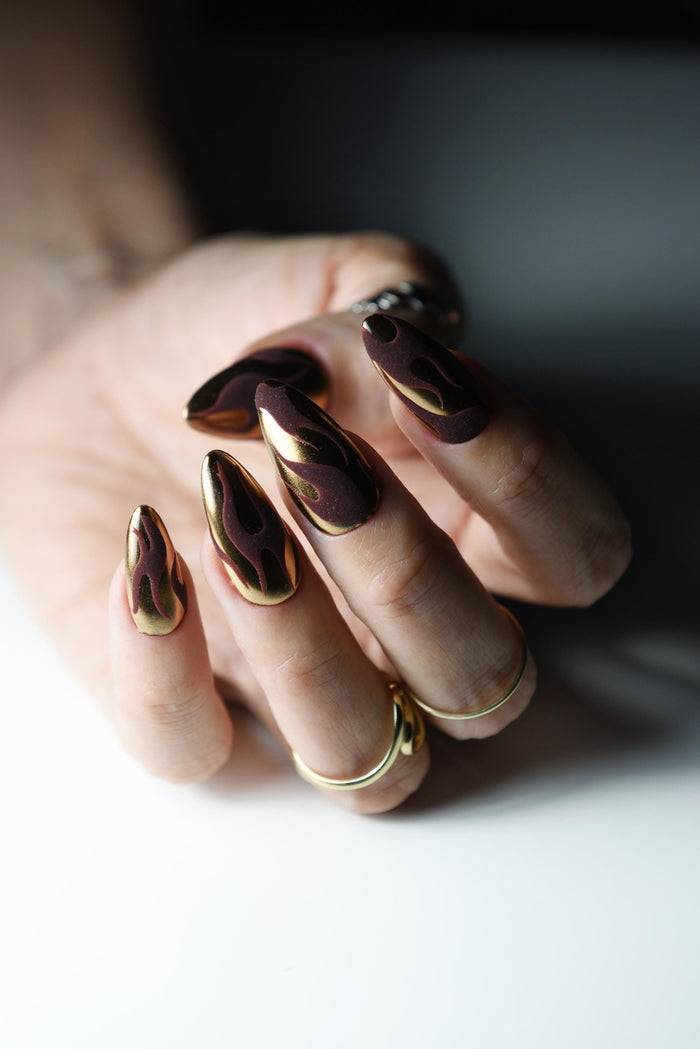 Bronze copper mirror chrome press-on nails with dark matte flame art – detail view