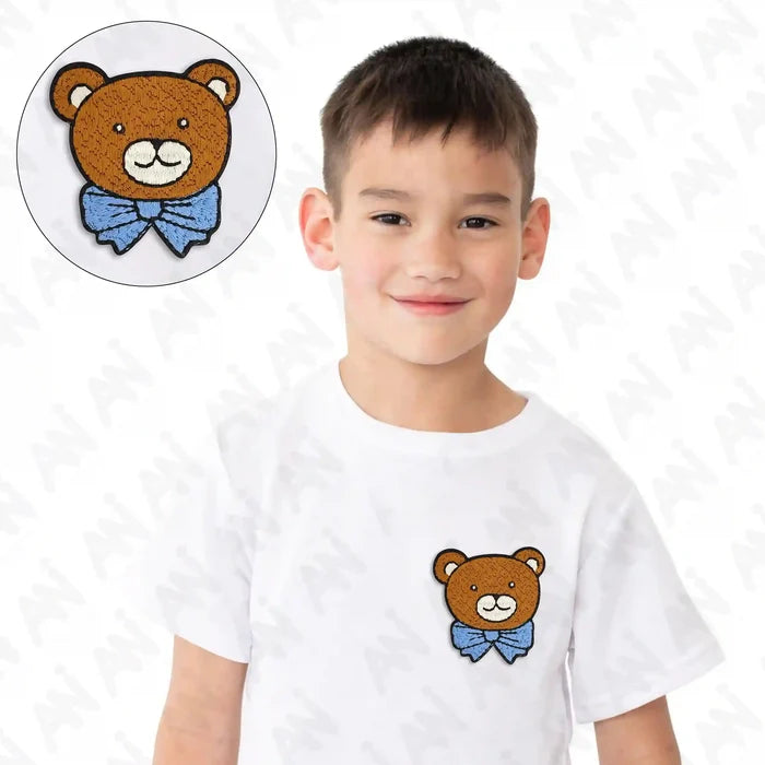 Ani Accessories cuddly bear patch shown on T-shirt for jackets shirts denim jeans bags and DIY clothing projects