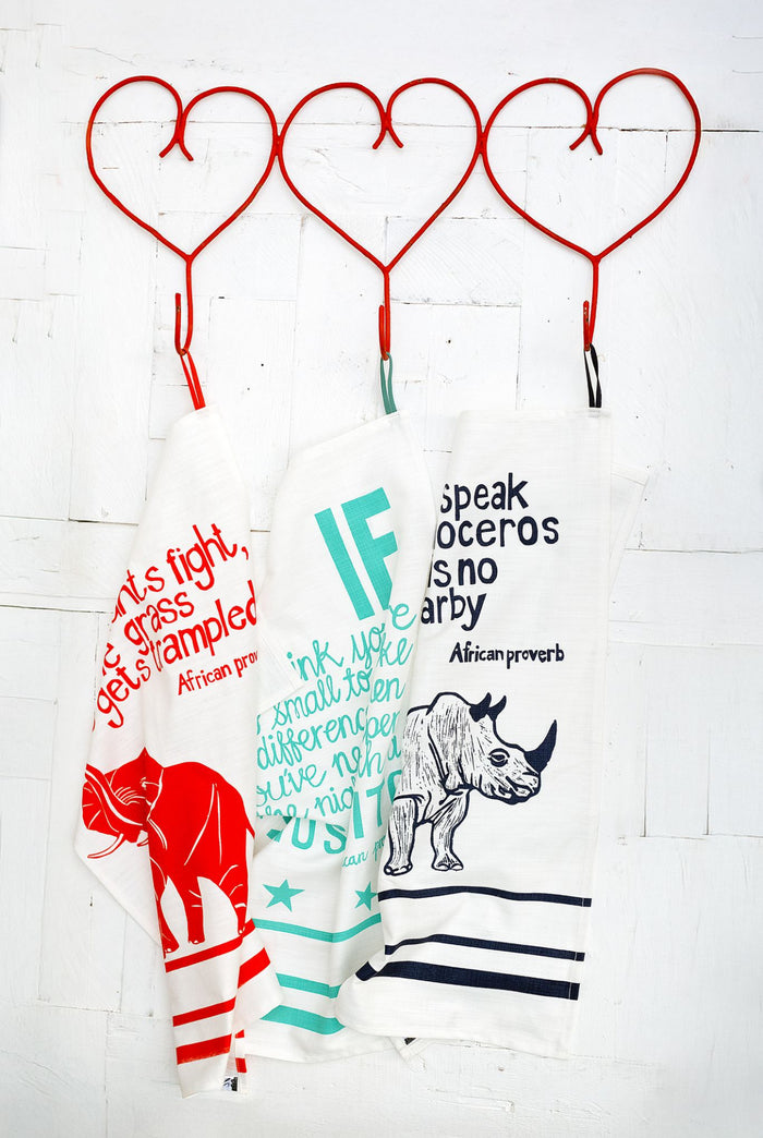 "Do Not Speak Of A Rhinoceros" African Proverb Tea Towel