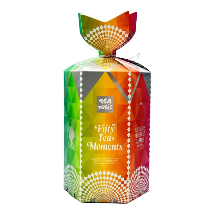A colourful hexagonal tea gift box with a tied top, labeled 'Tea Tonic' and 'Fifty Tea Moments', shown on a plain white background.