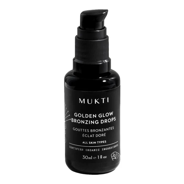 A black pump bottle of MUKTI Golden Glow Bronzing Drops on a solid white background.