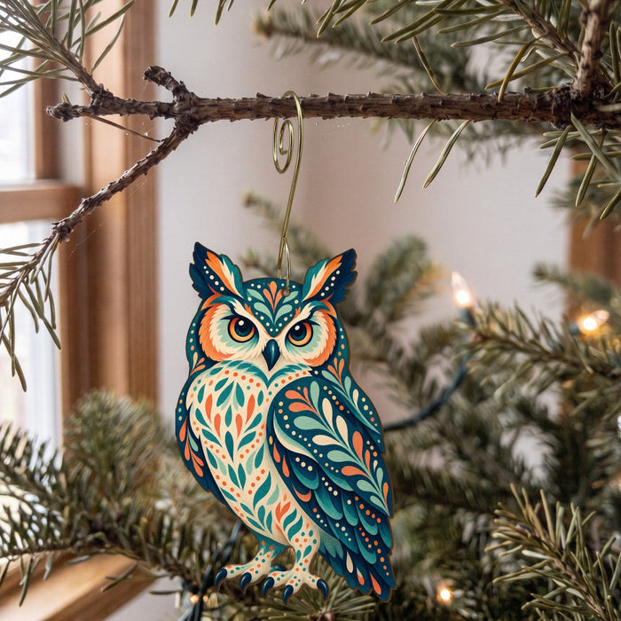 Laser-cut maple wood Great Horned Owl folk art ornament O297 hanging on a fir branch, made in USA