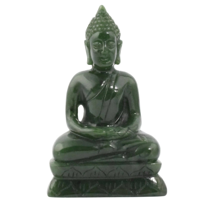 Green stone Buddha statue on a white background