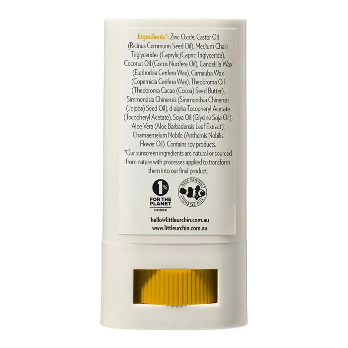 A white cylindrical cosmetic tube with a printed back panel showing ingredients and logos, photographed on a plain white background.