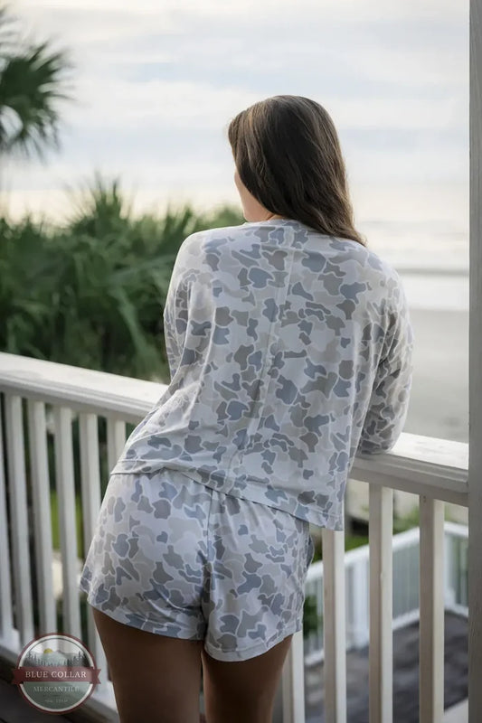 Local Girl Outfitters L5130029-FCW LG Revive 2.0 Crew Long Sleeve Cropped Shirt lifestyle image of girl at the beach looking out of balcony