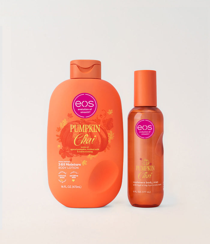A bottle of EOS Pumpkin Chai body lotion and a matching pump bottle of EOS Pumpkin Chai conditioner, both in orange packaging, on a light gray background.