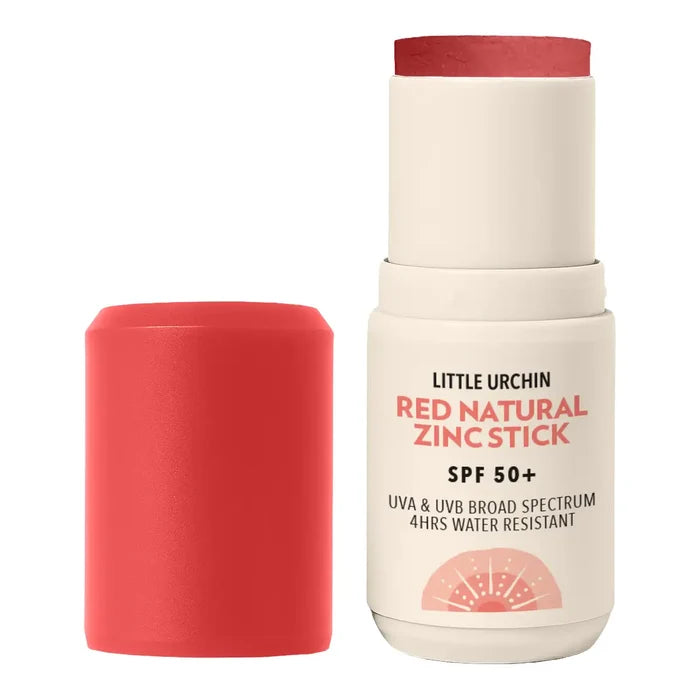 Little Urchin Red Natural Zinc Stick SPF 50+ sunscreen stick shown with its cap removed, displaying the coral-red stick inside.