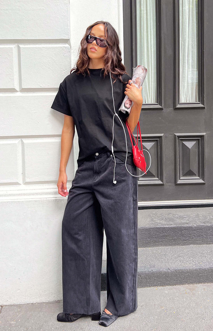 Beginning Boutique She's Yours Black Wide Leg Boyfriend Jeans washed black wide leg boyfriend jeans with a relaxed fit
