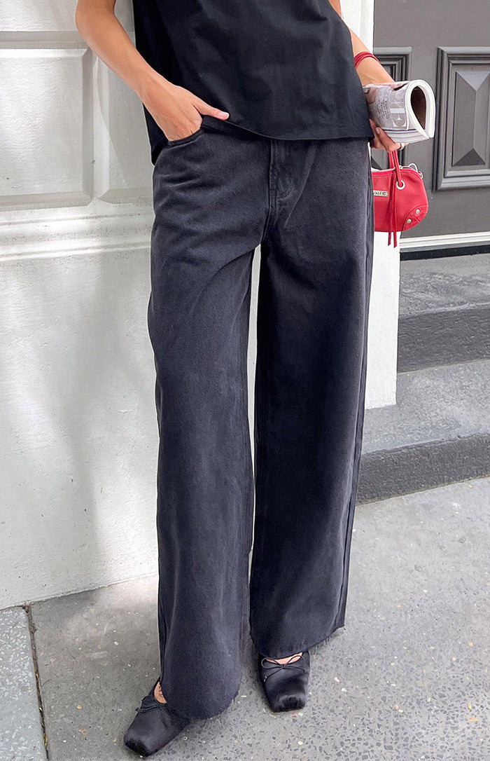 Relaxed fit faded black wide leg boyfriend jeans with a slightly distressed wash