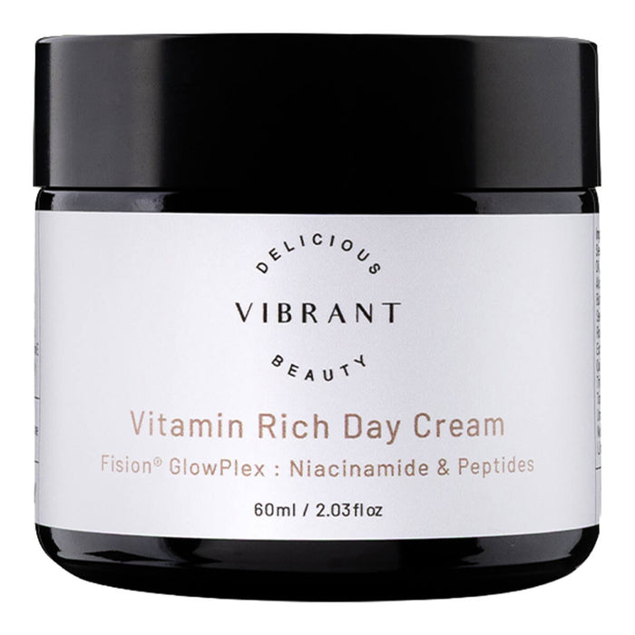 A black cosmetic jar of Vitamin Rich Day Cream with a white label, shown against a plain white background.
